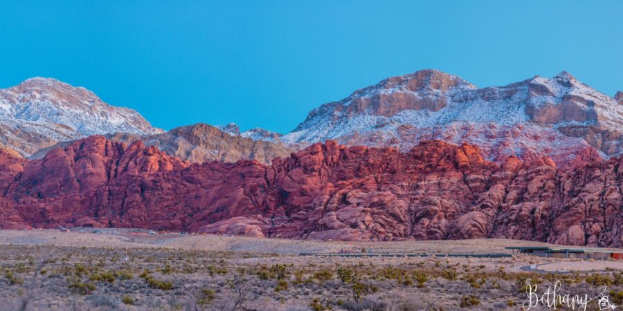 Day Trips from Las Vegas. A stunning view of Red Rock Canyon near Las Vegas, showcasing red cliffs and desert beauty.