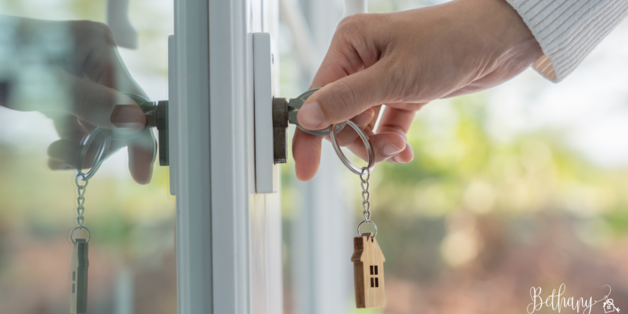 A person turning the key in the lock of their new home | Making a New City Feel Like Home